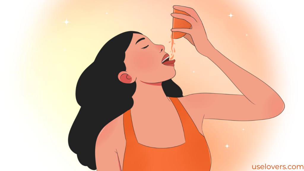 Mulher chupando uma laranja