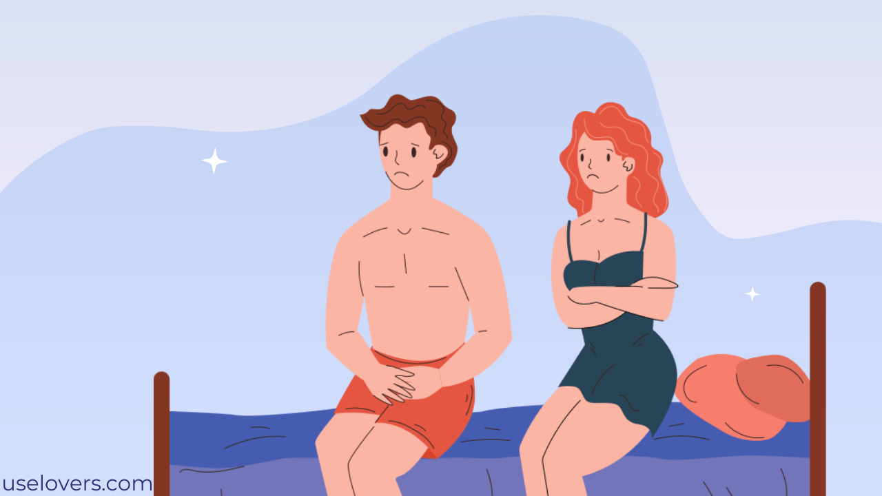 Duas pessoas sentadas na cama, a mulher com cara de triste e o homem com cara de preocupado